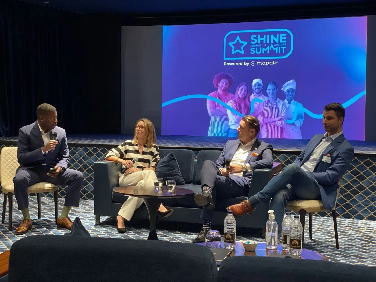 Chris Clark facilitating a leadership panel at the Shine Summit